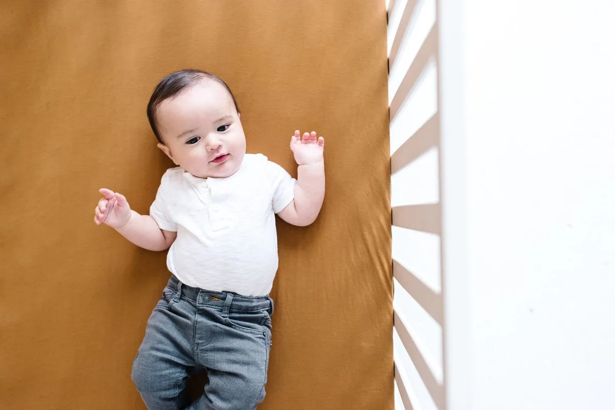 Copper Pearl Premium Knit Fitted Crib Sheet | Camel