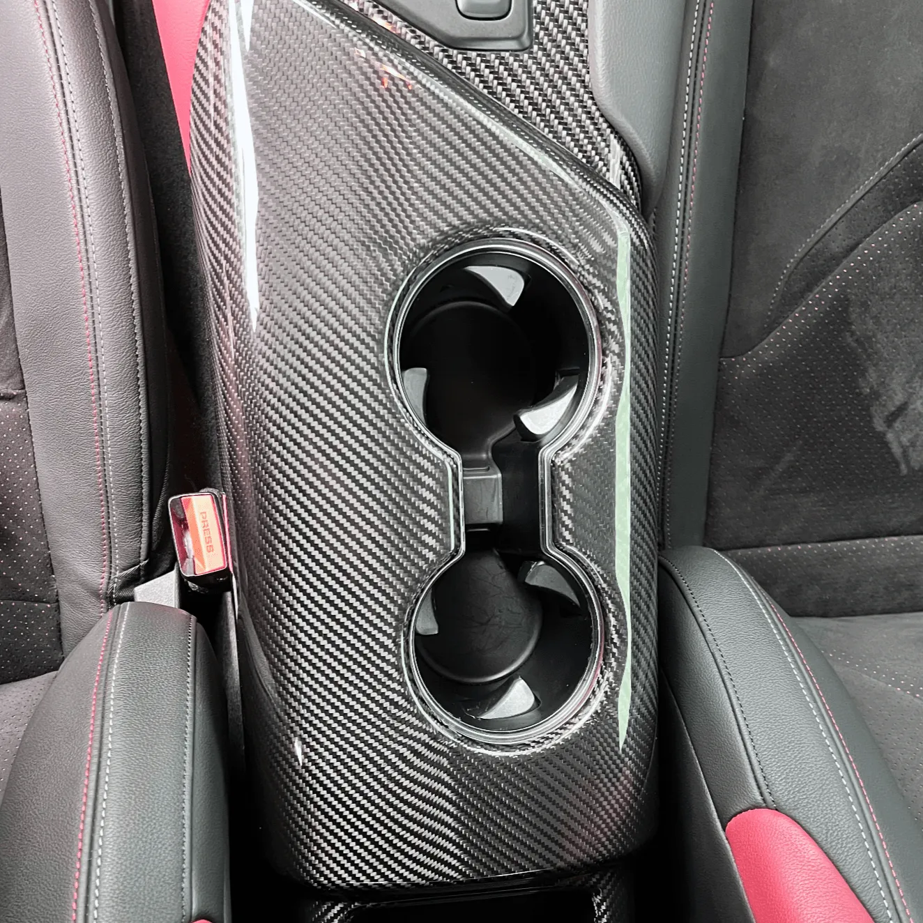 Rexpeed Dry Carbon Fiber Armrest/Cup Holder (MK5 Supra)